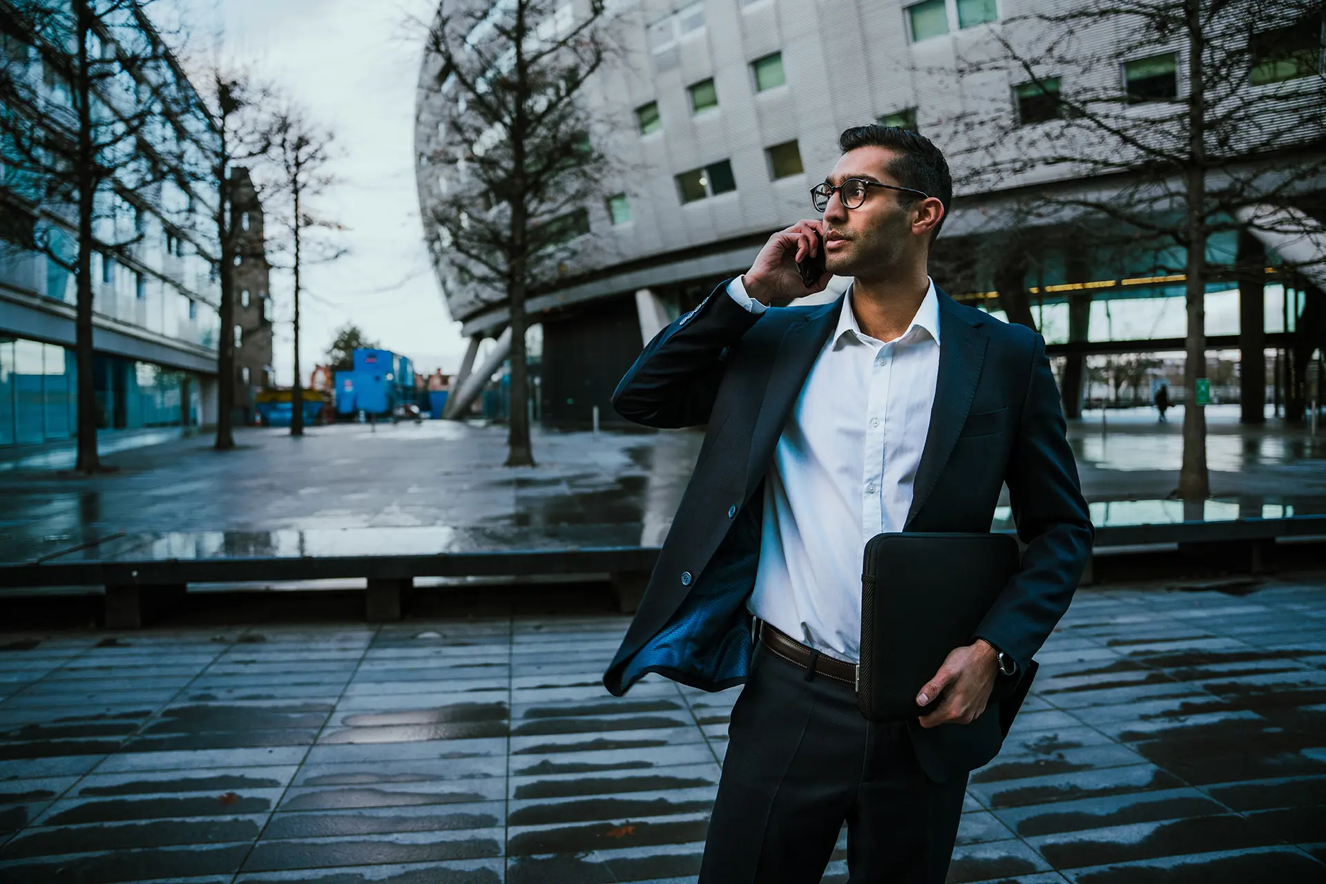 Professional reviewing H-1B transfer documents with attorney